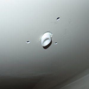 Media 'Drain tube cut at angle and a little longer so that dirty water from anchor locker does not stain hull.' in album 'Plugged side drain holes.  Built bottom to drain to starboard corner.  Also fiberglassed between anchor locker and port/stbd lockers.'