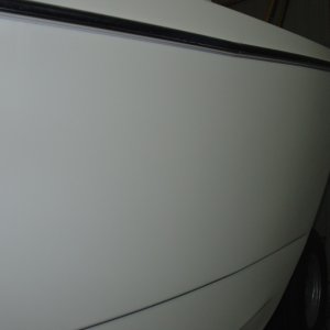 Media 'Both previous drains are plugged and gel coated for a clean look.' in album 'Plugged side drain holes.  Built bottom to drain to starboard corner.  Also fiberglassed between anchor locker and port/stbd lockers.'