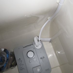 potti with top tank removed to show plumbing connections to MSD fitting suppied with marine kit including hold-down brackets