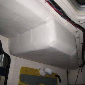1/8th inch thick adhesive foam tape applied to overhead in v-berth