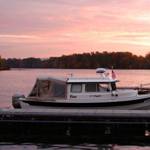 Fall Sunrise at Goosepond Marina features vivid pink hues.