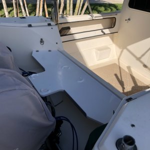 Media 'Honda EU2200 Generator rubber feet lock in
the halfmoon areas on shelf.' in album 'Generator/ Utility fiberglass platform 
Cedar anchor locker for aft anchor.'