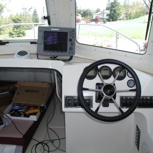 Helm taking shape. E-80, KVH Azimuth 1000 Compass. Honda Digital gauges plus water pressure indicators.