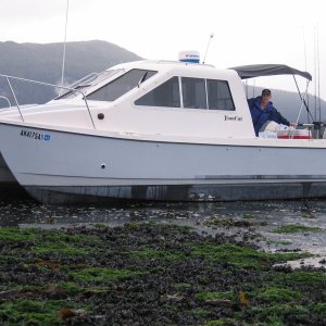 Going dry in Kachemak Bay to load up on 190 Qts of clams in the shell.  Very, very slight leading edge dings on the prop that I used to come into the bay on.