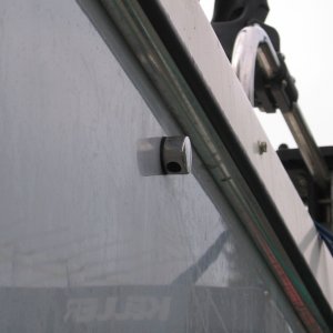 This is the improperly installed vent that allowed GALLONS of water into our fuel tank.  Most every C-Dory vent on the TC-24 is above the rubrail.
