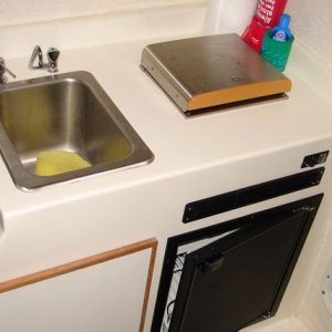 Media 'Single Burner Wallas, refrigerator, pressure water sink' in album 'At the St Joe Bay Public ramp about to launch'