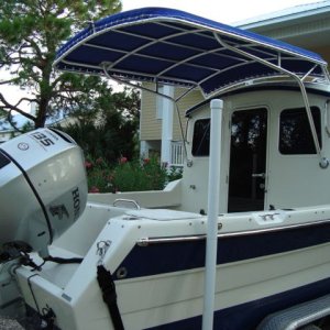 Media 'Custom Cantilevered Sunbrella Canvas Rack; great for fishing' in album 'At the St Joe Bay Public ramp about to launch'