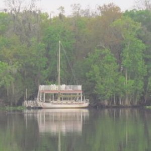 A sailboat tied up along side Turkey Island