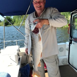 Midnight Flyer\'s Colby pretty happy with his catch of Lake Trout