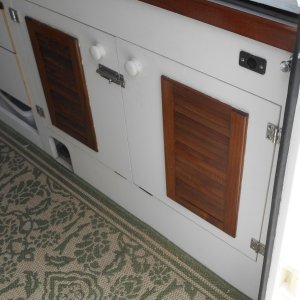 Added louvers to cool new refer under sink.