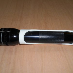 I wanted the flashlight handier than rattling around in a drawer.