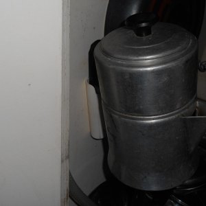 Keeps the pot together, no rattle, stays put.