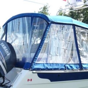 3. I prefer the clear plastic window to wrap around the outside of the lazarette storage compartments. This allows me more horizontal storage space when were not traveling and keeps the lazarette's dry.