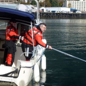 Attaching tow line with skiff hook
