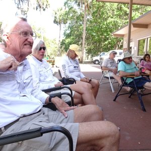 John and Eileen listen intently--others seem to be enjoying the siesta.
