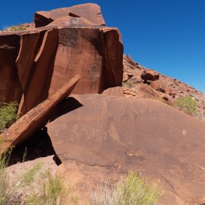 Cha canyon has some petroglyphs, but many have been vandalized like this.  Maybe they couldn't see that they were defacing older petroglyphs?