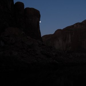 A full moon peeks out.