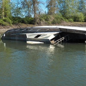 Anybody need a bow pulpit?  The stern rail might fit a 22.