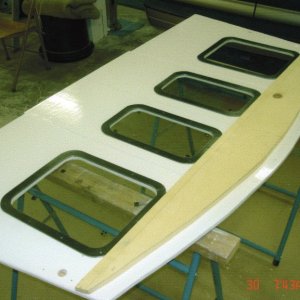 Media 'June 2005:  Setting the window frames.' in album 'July 2005:  Bulkhead installed.  Note: Areas to be fiberglassed have been left unpainted.'