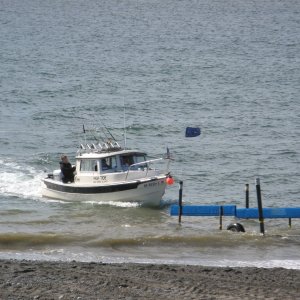 Surf landing @ Deep Creek, Alaska 
Not the time to hesitiate.  Go for it.