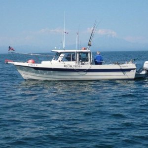 Fishing for Salmon on the "new" boat.
Smoking Mt.Redoubt volcano in the background.