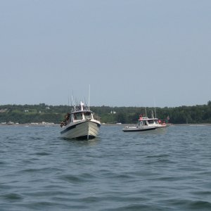 Twin 26' ProAnglers out trolling on July 4th, 2009