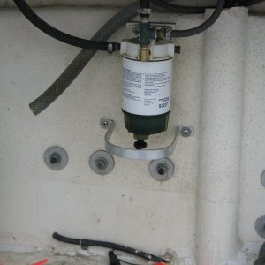 Aluminum guard around plastic fuel filter sight glass.
June 2010