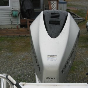 7/22/12 Painted cowling to repair the peeling gray paint.  Used black "rattle can" bedliner spray; 3 coats.