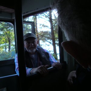 This is the guy who operates the bakery boat...making a special delivery to the bus driver.