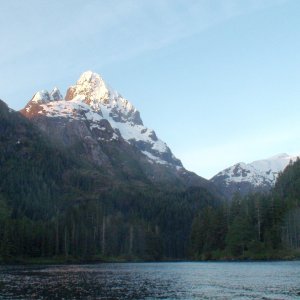 The access to our Gut Bay anchorage was through the channel in their middle of trees in this photo.  The mountain towered 4500 feet above it.