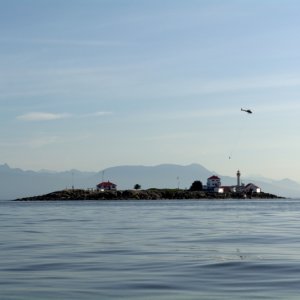 Helicopter dropping cement on Entrance Island