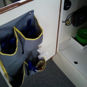 storage pockets for utensils on galley door