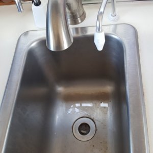 I  installed a new faucet, a 20 micron filtered hand pump, and a raw water foot pump.