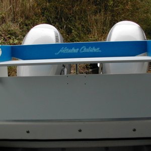 (rogerbum) 1/2" Starboard transom board retained with 1/2" aluminum C-channel, magma filet table