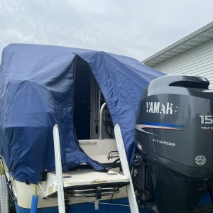 Stern view, zipper door open, new custom cover