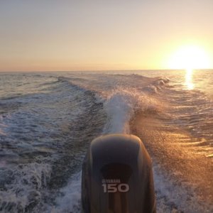 Media 'making good time flat seas heading to Key West auto pilot on running 20 to 23 mph. Looking for fishpots, steering with the hand held remote for the auto pilot' in album 'Lucy enjoying a Sundowner at Bahia Honda Key March 2011'