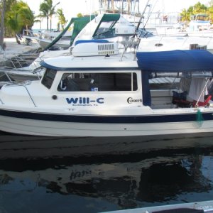 fixed docks the length of the boat but only about a foot of tide easy on and off.