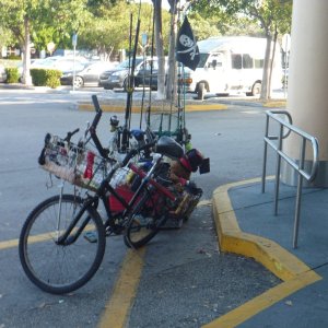 A local bicycle outfitted for fishing with attached trailer