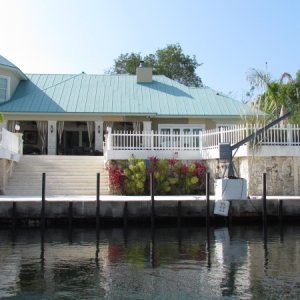 A beautiful home along the          Marvin D. Adams waterway Key Largo