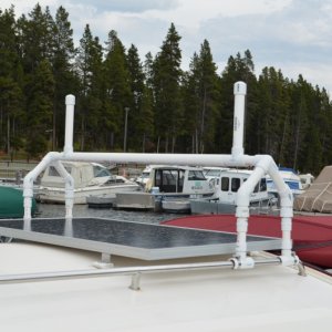 I have since shortened the two upright lengths by 1/2.  They were simply too tall and made it needlessly difficult to lift the kayak up and over.  They are there to help keep the kayak in place and from sliding sideways.   I secure the kayak with 2 ratchet straps.   It does not move an inch.