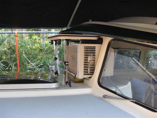 (004 4) AC viewed from side, plenty of room for brackets and protected from rain by window