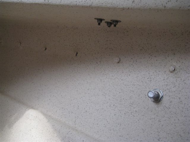 013 13
Lump of 5200 after I tapped them with a hammer and piece of 5/8" thin wall pipe.  Made a pretty good plug