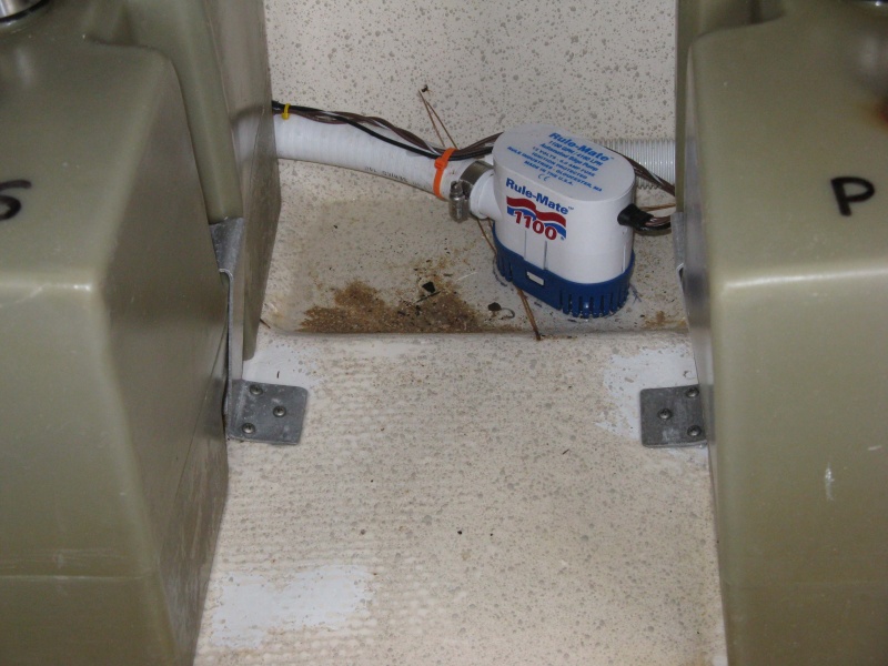0713 Cleaned up tanks re-installed.  Holes were opened with Dremmel and filled with Marine Tex