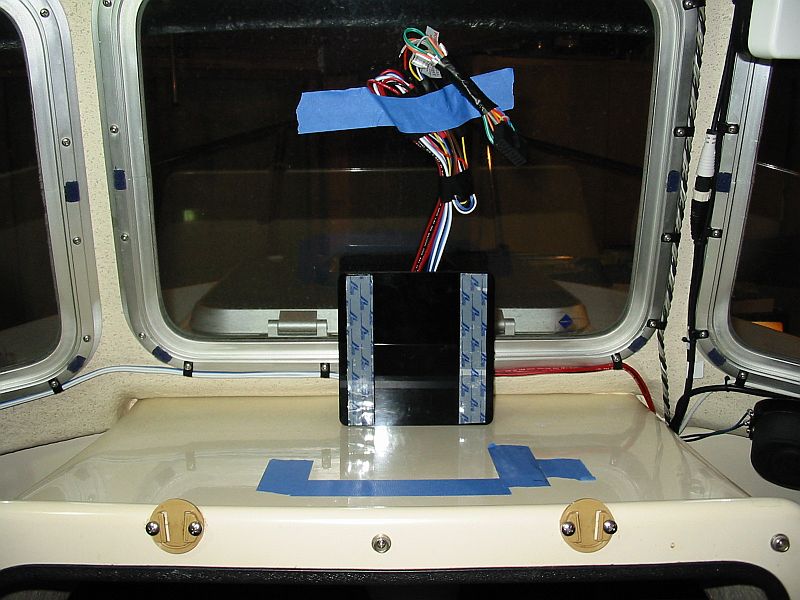 1/2"X6"X6" acrylic(Tap Plastics) secured with velcro.