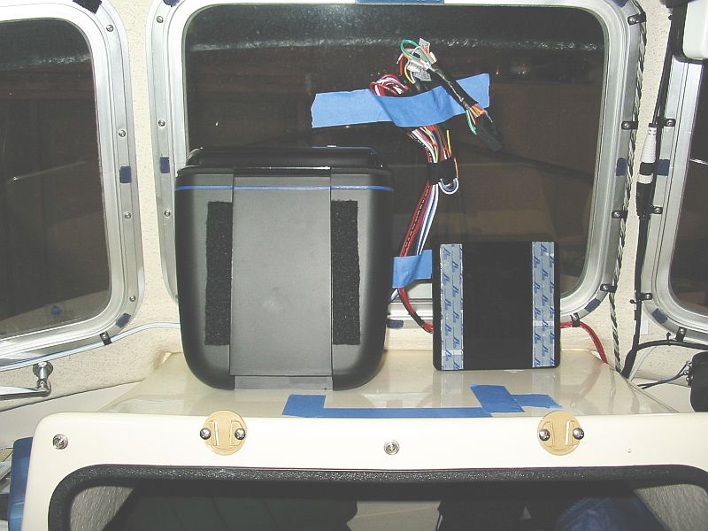1/2"X6"X6" acrylic(Tap Plastics) secured with velcro.