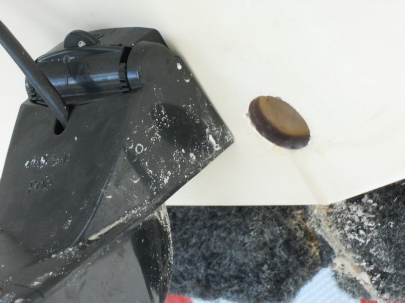 1" hole in Stbd. transom. Slightly R. of center due to Triducer.
