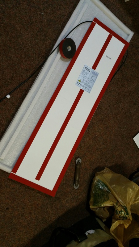 1 inch wide high bond 3m tape.  Small gaps on one side are for drainage on the low edge if any water sneaks behind it