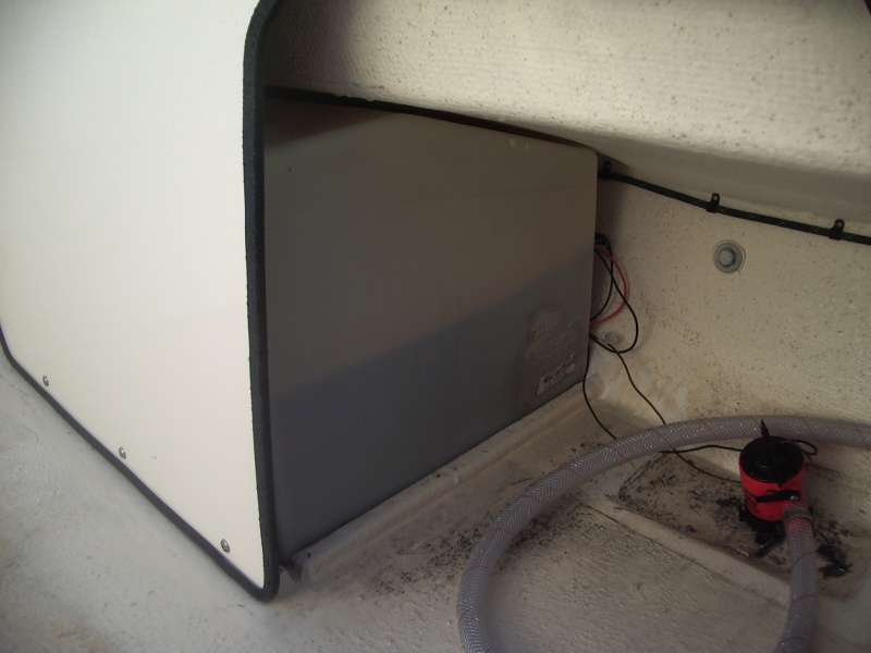 $10.00 bilge pump.  Project under construction.  Factory "glassed" in the fuel tanks, added new front dividers too.