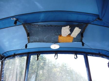 10. The "bag" net and black locking clips work well for drying stuff. The white portable LED light shines over the cooler at night.