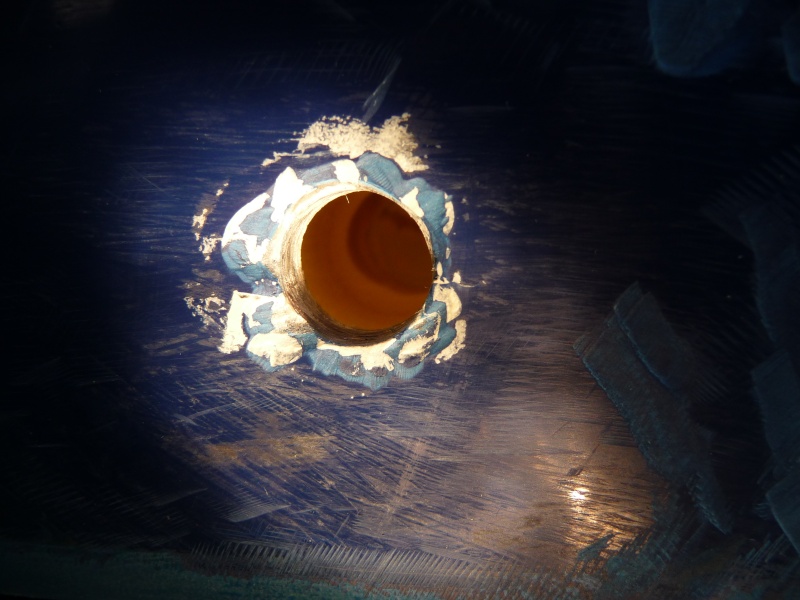 14. Can you see inside the Dremeled out hole? Past the 3/8" hole in the outside layer of fiberglass, you should be able to see how the inside of the hole is larger in order to hold more epoxy and seperate the fastener in epoxy from the core.